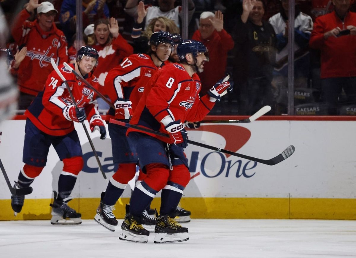 Apr 4, 2025; Washington, District of Columbia, USA;  Washington Capitals left wing Alex Ovechkin (8) celebrates with teammates after scoring a goal in the first period against the Chicago Blackhawks at Capital One Arena. Mandatory Credit: Geoff Burke-Imagn Images