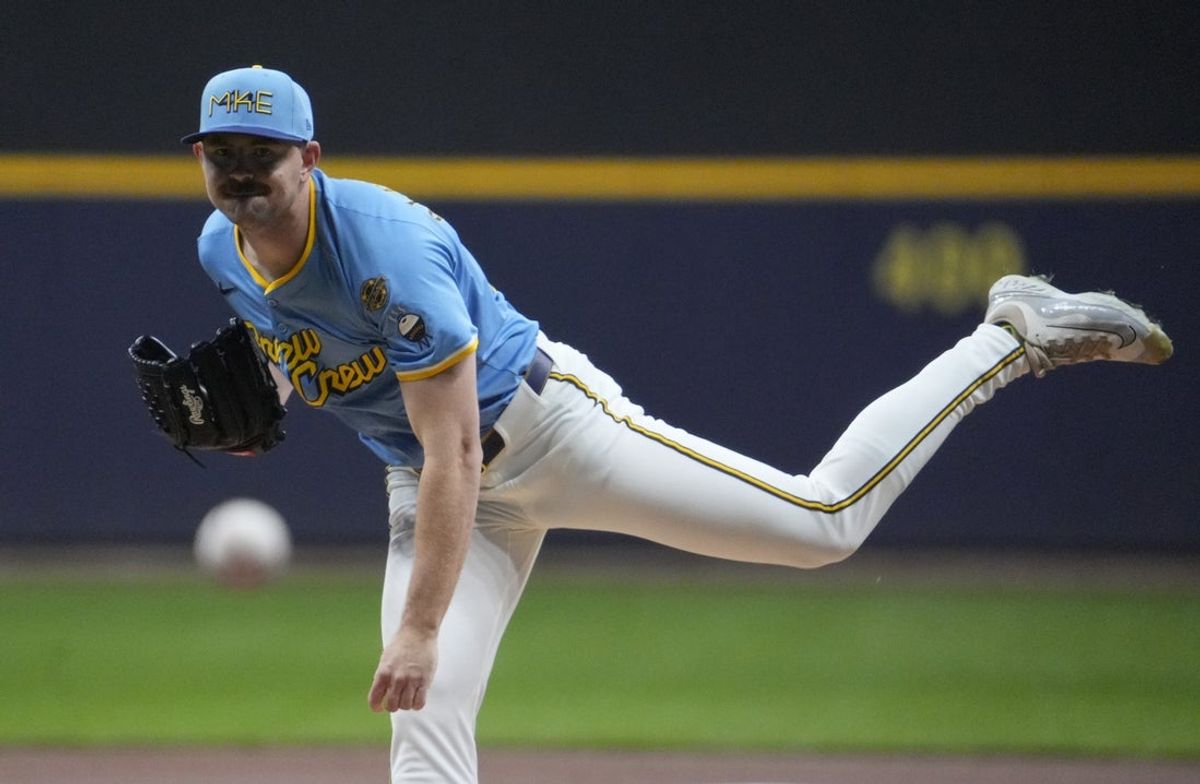 Apr 4, 2025; Milwaukee, Wisconsin, USA; Milwaukee Brewers pitcher Tyler Alexander (33) delivers a pitch against the Cincinnati Reds in the first inning at American Family Field. Mandatory Credit: Michael McLoone-Imagn Images