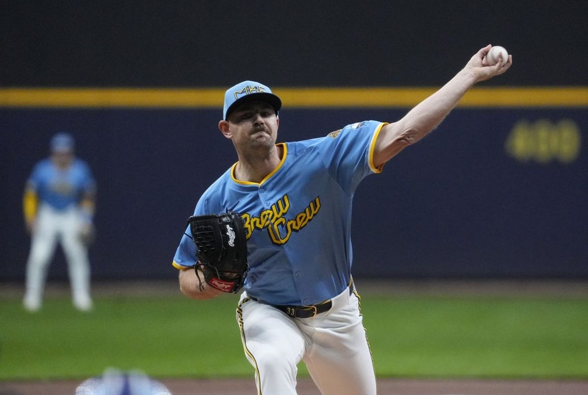Apr 4, 2025; Milwaukee, Wisconsin, USA; Milwaukee Brewers pitcher Tyler Alexander (33) delivers a pitch against the Cincinnati Reds in the first inning at American Family Field. Mandatory Credit: Michael McLoone-Imagn Images