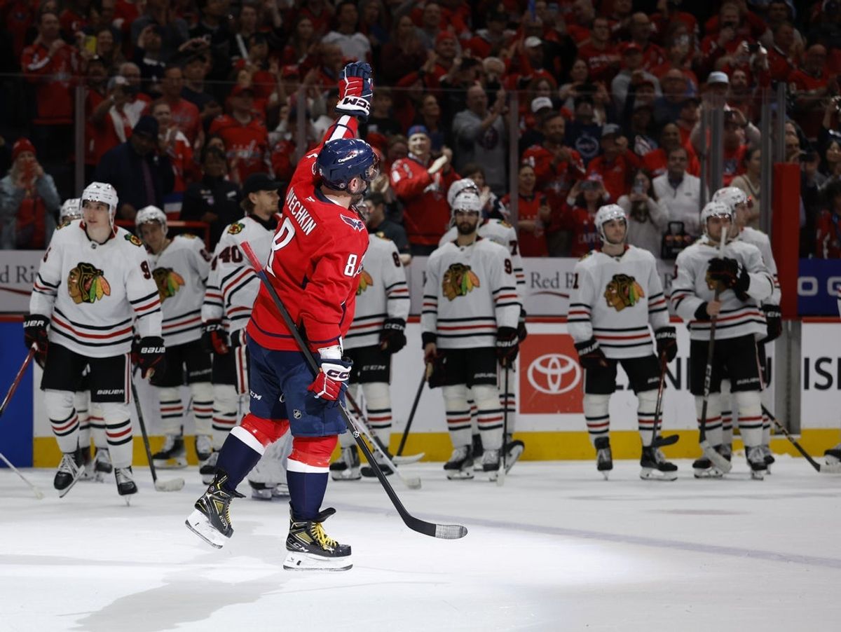 Apr 4, 2025; Washington, District of Columbia, USA; Washington Capitals left wing Alex Ovechkin (8) waves to the crowd after the game against the Chicago Blackhawks at Capital One Arena. Ovechkin scored the 893rd and 894th goals of his career, tying Wayne Gretzky for most all-time goals scored in the NHL. Mandatory Credit: Geoff Burke-Imagn Images