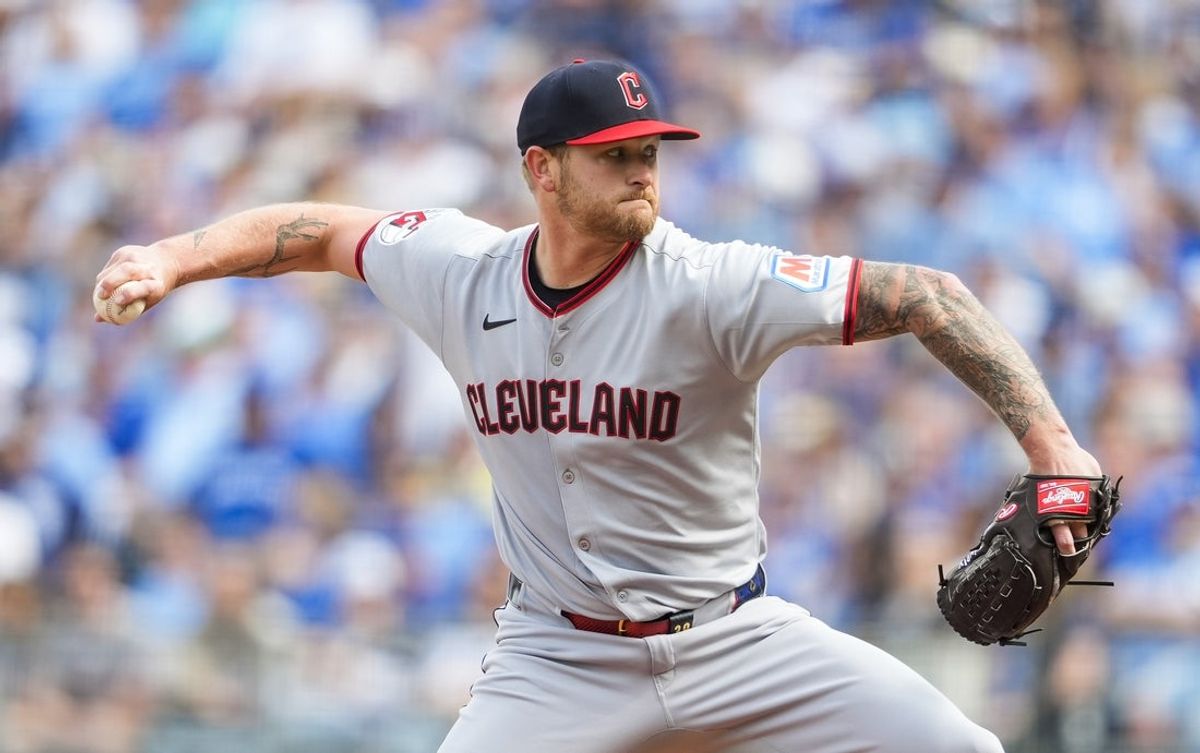 Mar 27, 2025; Kansas City, Missouri, USA; Cleveland Guardians starting pitcher Ben Lively (39) pitches during the first inning against the Kansas City Royals at Kauffman Stadium. Mandatory Credit: Jay Biggerstaff-Imagn Images
