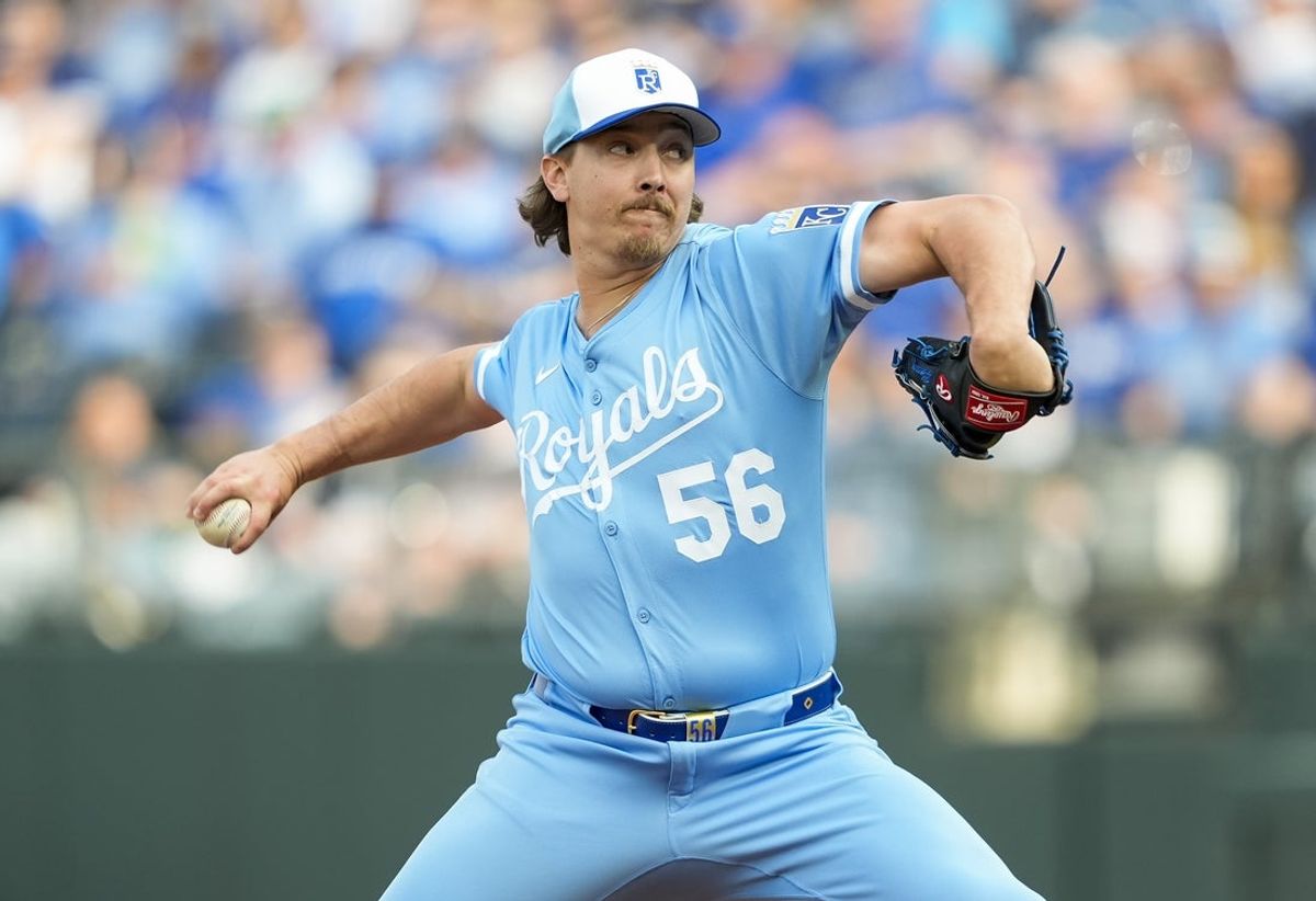 Mar 27, 2025; Kansas City, Missouri, USA; Kansas City Royals relief pitcher Hunter Harvey (56) pitches during the eighth inning against the Cleveland Guardians at Kauffman Stadium. Mandatory Credit: Jay Biggerstaff-Imagn Images