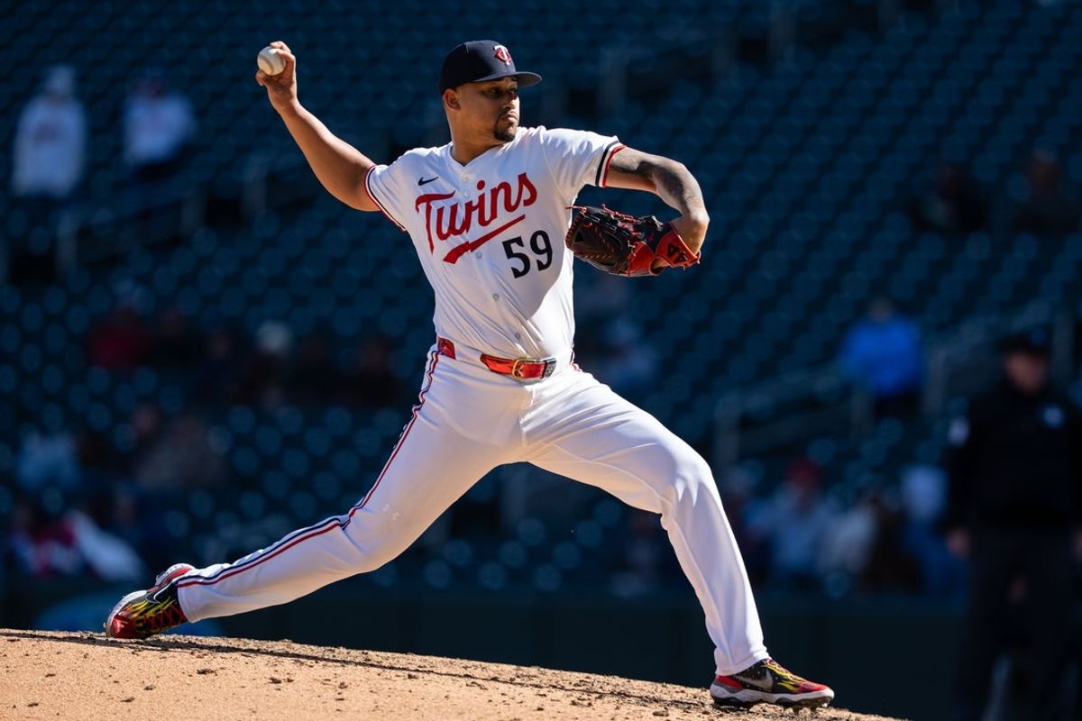 Apr 5, 2025; Minneapolis, Minnesota, USA; Minnesota Twins relief pitcher Jhoan Duran (59) delivers a pitch during the ninth inning against the Houston Astros¡ at Target Field. Mandatory Credit: Jordan Johnson-Imagn Images