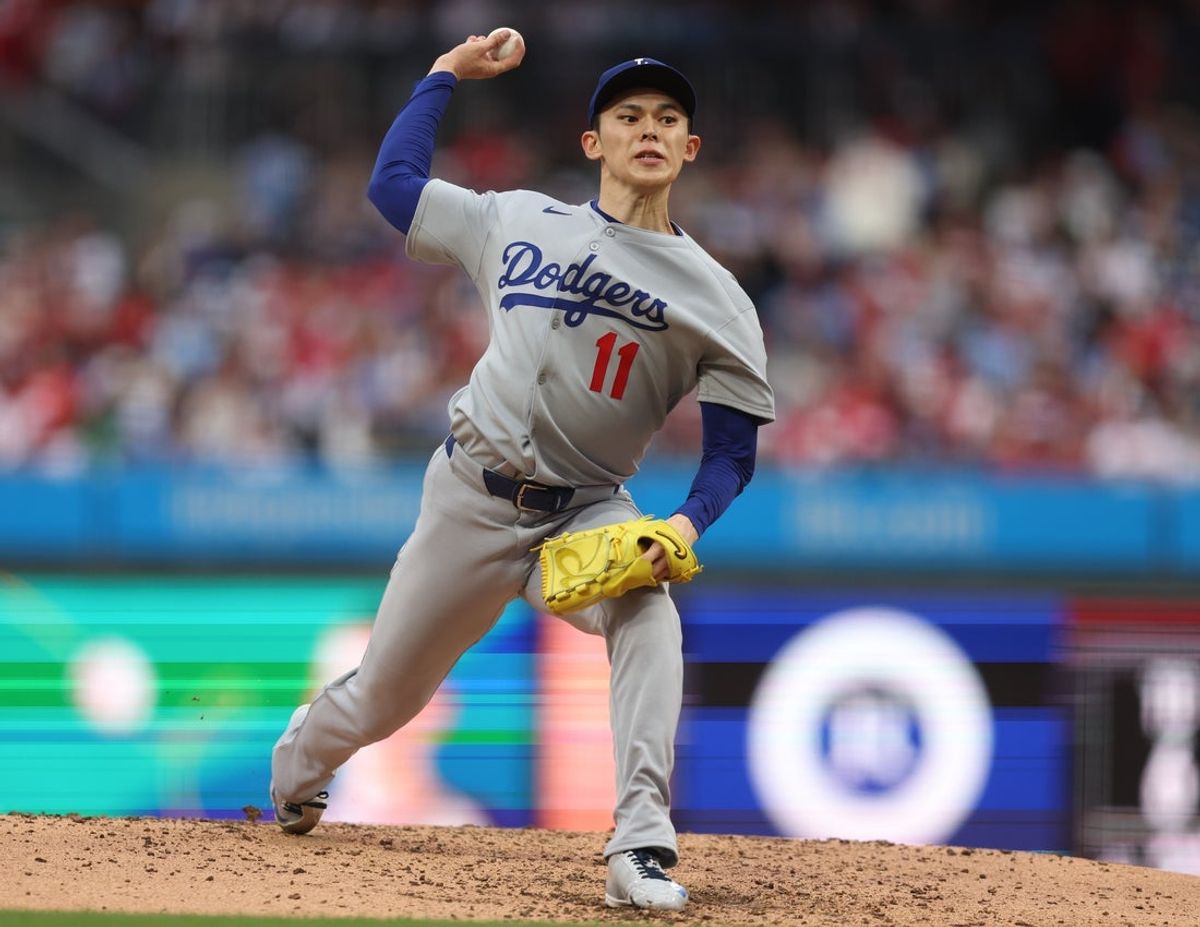 Apr 5, 2025; Philadelphia, Pennsylvania, USA; Los Angeles Dodgers pitcher Roki Sasaki (11) throws a pitch against the Philadelphia Phillies during the fourth inning at Citizens Bank Park. Mandatory Credit: Bill Streicher-Imagn Images