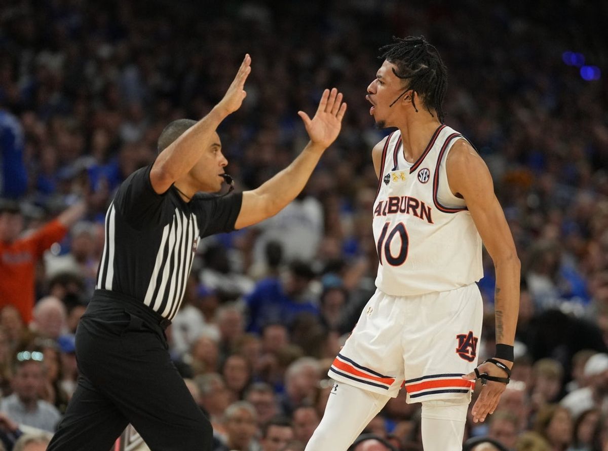 Apr 5, 2025; San Antonio, TX, USA;  Auburn Tigers guard Chad Baker-Mazara (10) reacts against the Florida Gators in the semifinals of the men's Final Four of the 2025 NCAA Tournament at the Alamodome. Mandatory Credit: Robert Deutsch-Imagn Images
