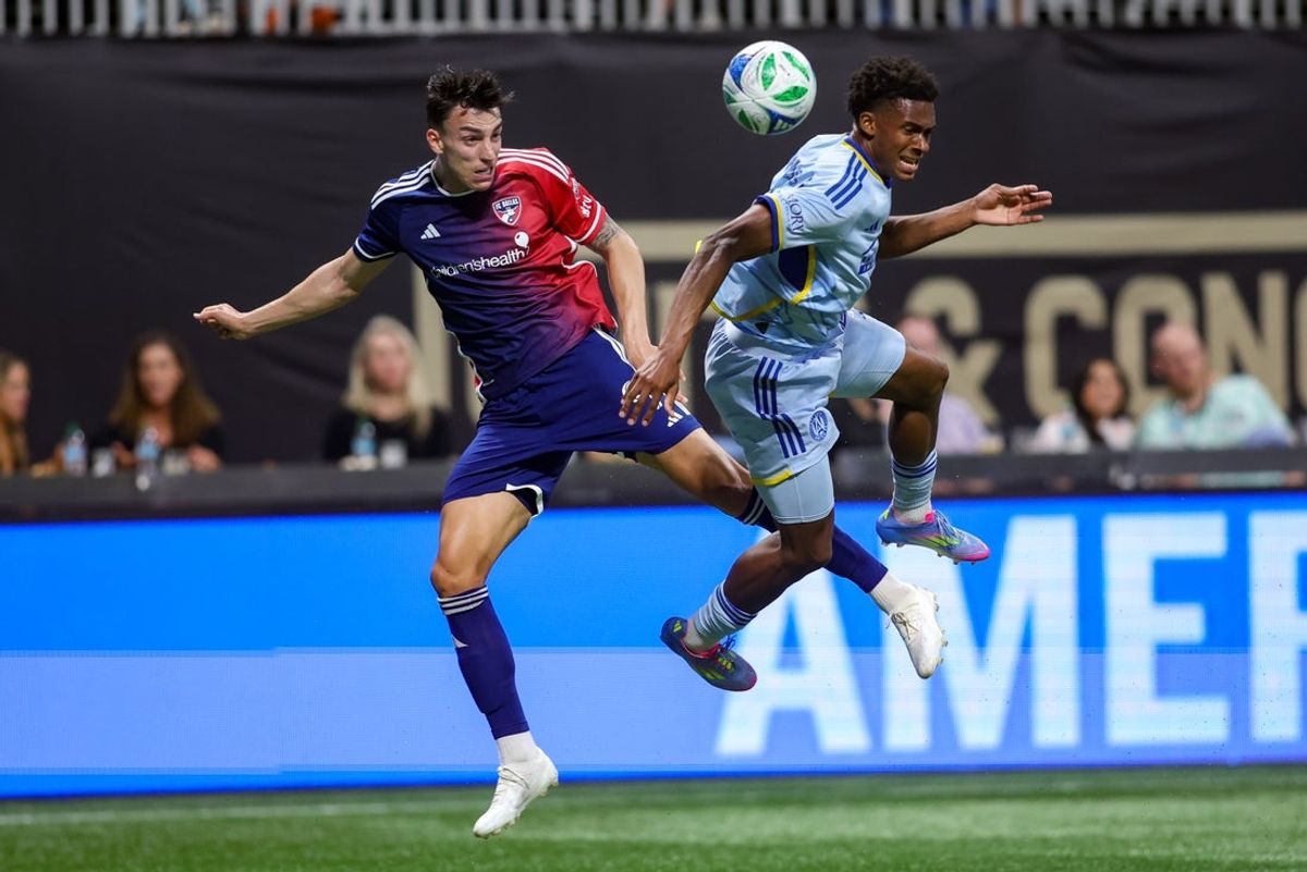 Apr 5, 2025; Atlanta, Georgia, USA; FC Dallas forward Petar Musa (9) is defended by Atlanta United defender Matthew Edwards (47) in the first half at Mercedes-Benz Stadium. Mandatory Credit: Brett Davis-Imagn Images
