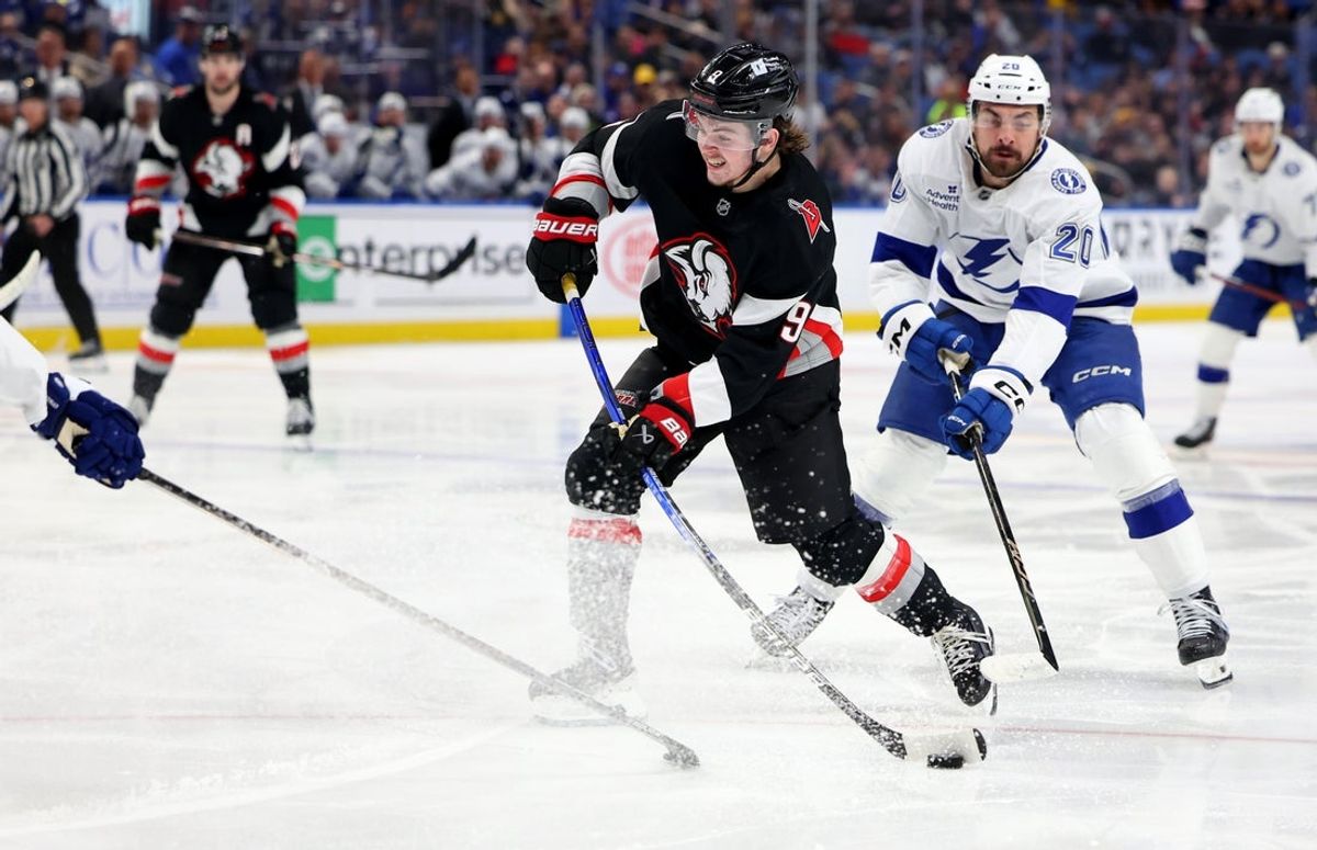 Apr 5, 2025; Buffalo, New York, USA;  Buffalo Sabres left wing Zach Benson (9) takes a shot on goal during the second period against the Tampa Bay Lightning at KeyBank Center. Mandatory Credit: Timothy T. Ludwig-Imagn Images