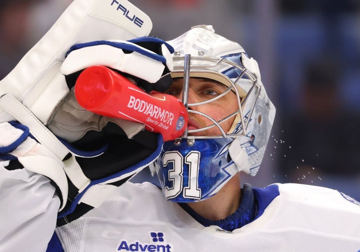 Apr 5, 2025; Buffalo, New York, USA;  Tampa Bay Lightning goaltender Jonas Johansson (31) gets a drink during a stoppage in play against the Buffalo Sabres at KeyBank Center. Mandatory Credit: Timothy T. Ludwig-Imagn Images