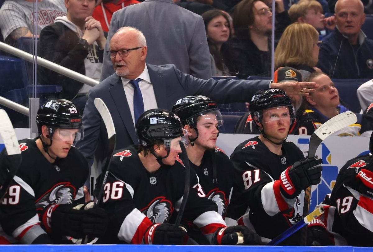 Apr 5, 2025; Buffalo, New York, USA;  Buffalo Sabres head coach Lindy Ruff talks to his team during the second period against the Tampa Bay Lightning at KeyBank Center. Mandatory Credit: Timothy T. Ludwig-Imagn Images