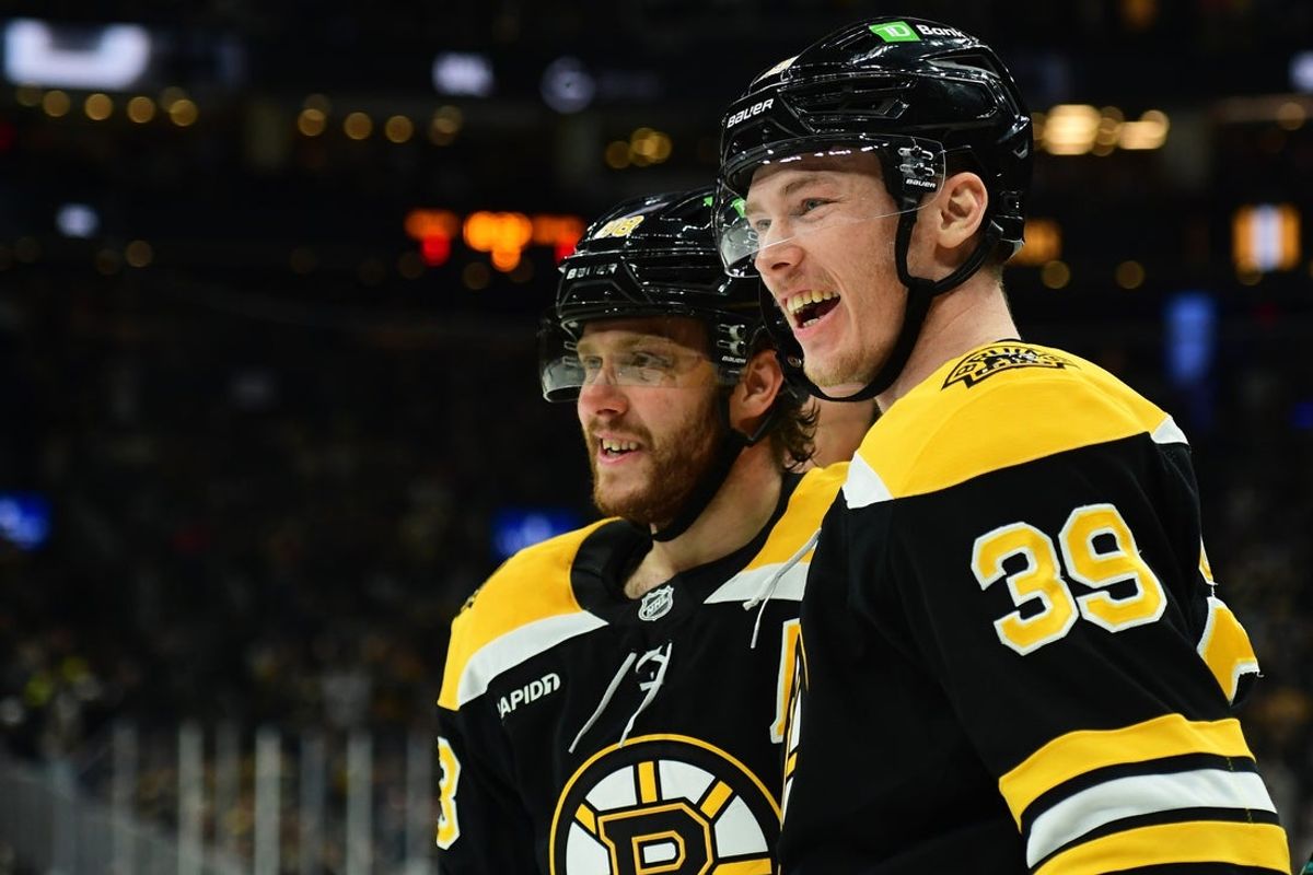 Apr 5, 2025; Boston, Massachusetts, USA; Boston Bruins center Morgan Geekie (39) reacts after a goal by right wing David Pastrnak (88) during the third period at TD Garden. Mandatory Credit: Bob DeChiara-Imagn Images
