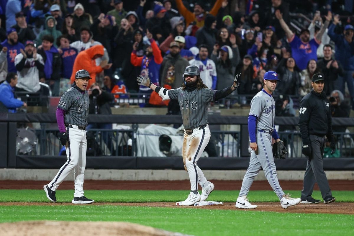 Apr 5, 2025; New York City, New York, USA;  New York Mets designated hitter Jesse Winker (3) celebrates after hitting a two-run triple in the eighth inning against the Toronto Blue Jays at Citi Field. Mandatory Credit: Wendell Cruz-Imagn Images
