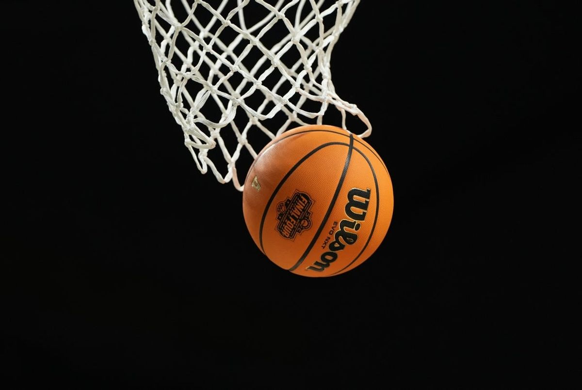 Apr 5, 2025; San Antonio, TX, USA; A detail view of a basketball going through the net during the second half in the semifinals of the men's Final Four of the 2025 NCAA Tournament at the Alamodome. Mandatory Credit: Bob Donnan-Imagn Images