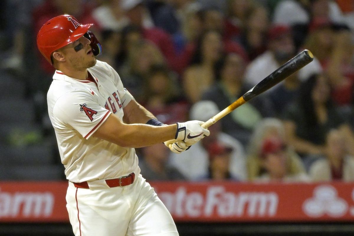 Apr 5, 2025; Anaheim, California, USA;  Los Angeles Angels center fielder Mike Trout (27) hits a two-run home run in the fifth inning against the Cleveland Guardians at Angel Stadium. Mandatory Credit: Jayne Kamin-Oncea-Imagn Images