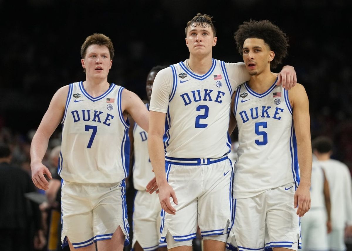 Apr 5, 2025; San Antonio, TX, USA;  Duke Blue Devils forward Cooper Flagg (2) and Duke Blue Devils guard Tyrese Proctor (5) react against the Houston Cougars in the semifinals of the men's Final Four of the 2025 NCAA Tournament at the Alamodome. Mandatory Credit: Robert Deutsch-Imagn Images