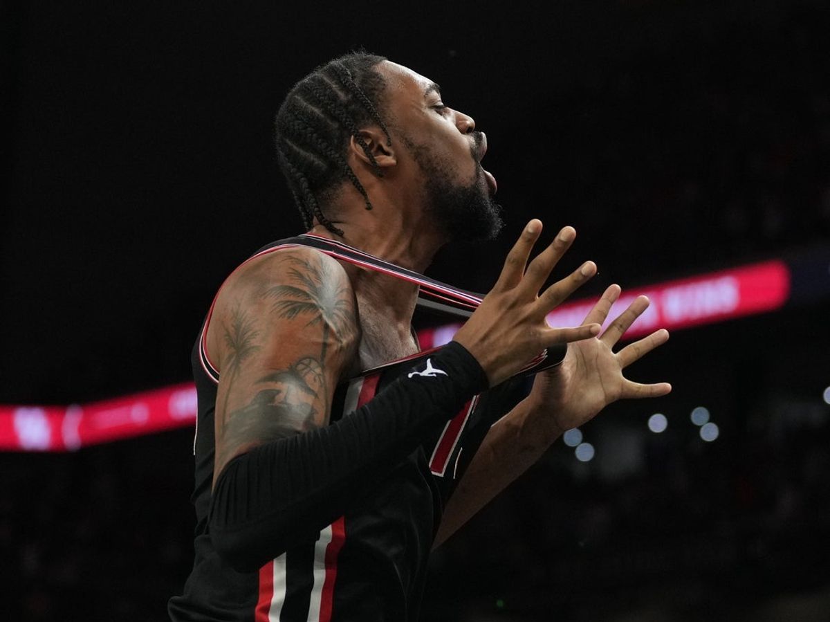 Apr 5, 2025; San Antonio, TX, USA;  Houston Cougars forward J'Wan Roberts (13) celebrates after defeating the Duke Blue Devils in the semifinals of the men's Final Four of the 2025 NCAA Tournament at the Alamodome. Mandatory Credit: Robert Deutsch-Imagn Images
