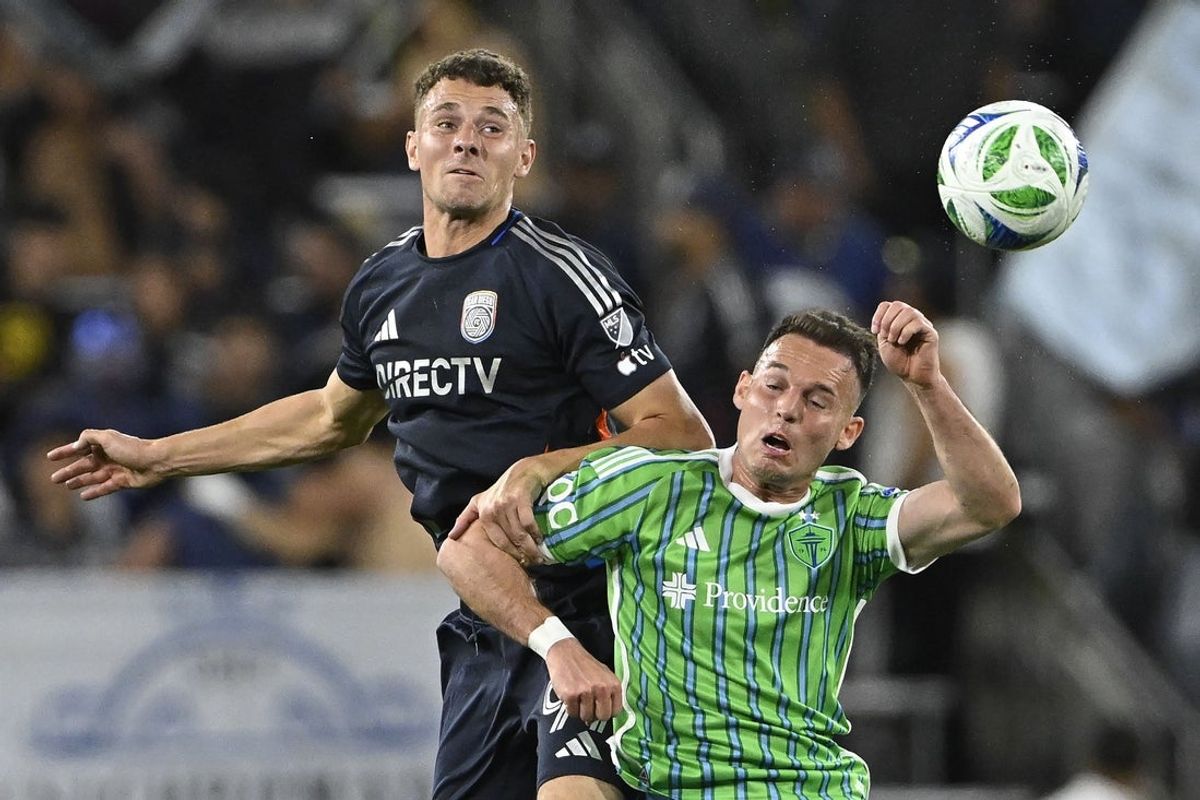 Apr 5, 2025; San Diego, California, USA; San Diego FC defender Christopher McVey (97) and Seattle Sounders forward Danny Musovski (19) fight for a header at Snapdragon Stadium. Mandatory Credit: Denis Poroy-Imagn Images