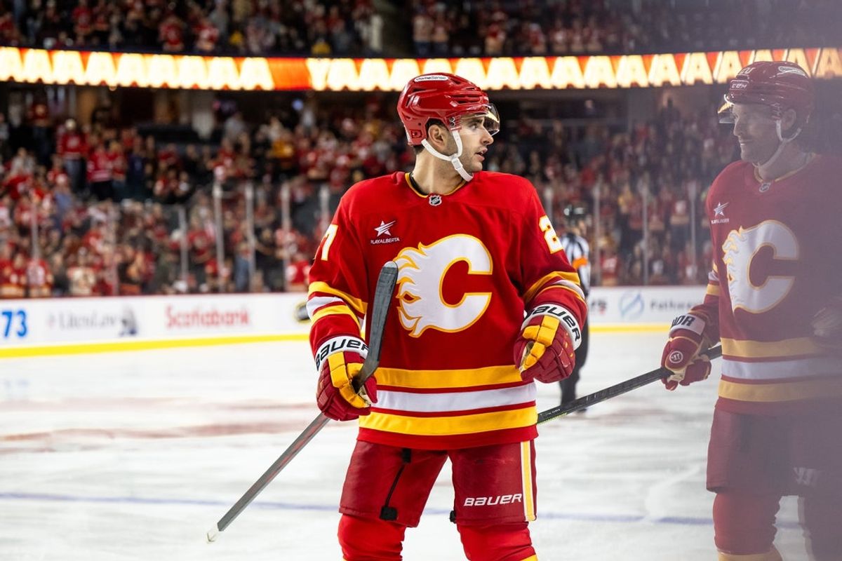 Apr 5, 2025; Calgary, Alberta, CAN; Calgary Flames right wing Matt Coronato (27) celebrates after scoring a goal against the Vegas Golden Knights during the third period at Scotiabank Saddledome. Mandatory Credit: Brett Holmes-Imagn Images