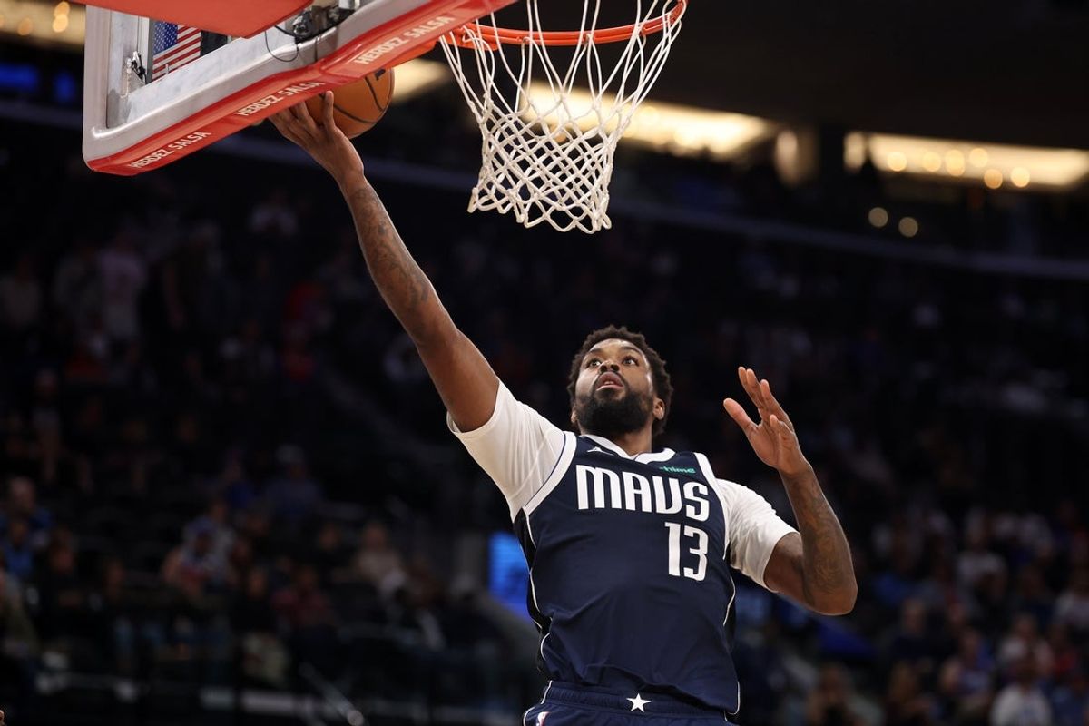 Apr 5, 2025; Inglewood, California, USA;  Dallas Mavericks forward Naji Marshall (13) goes to the basket during the second half against the Los Angeles Clippers at Intuit Dome. Mandatory Credit: Kiyoshi Mio-Imagn Images