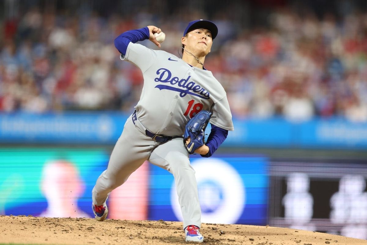 Apr 4, 2025; Philadelphia, Pennsylvania, USA; Los Angeles Dodgers pitcher Yoshinobu Yamamoto (18) pitches against the Philadelphia Phillies at Citizens Bank Park. Mandatory Credit: Bill Streicher-Imagn Images