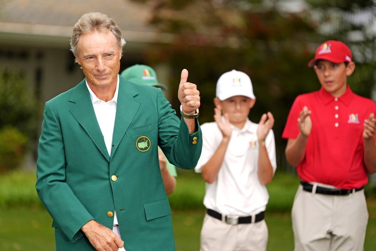 Apr 6, 2025; Augusta, Georgia, USA; Masters champion Bernhard Langer waves to patrons during the Drive, Chip & Putt National Finals at Augusta National Golf Club. Mandatory Credit: Katie Goodale-Imagn Images