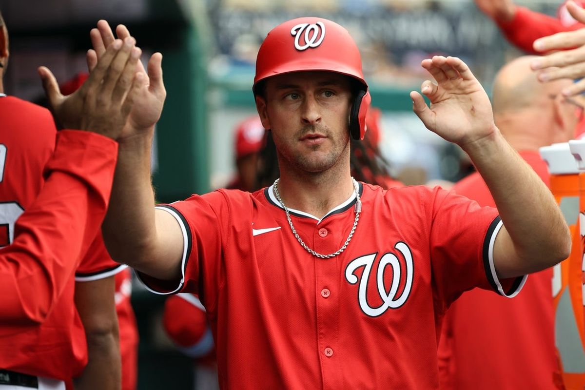 Apr 6, 2025; Washington, District of Columbia, USA; Washington Nationals shortstop Paul DeJong (14) celebrates after scoring a run during the second inning against the Arizona Diamondbacks at Nationals Park. Mandatory Credit: Daniel Kucin Jr.-Imagn Images
