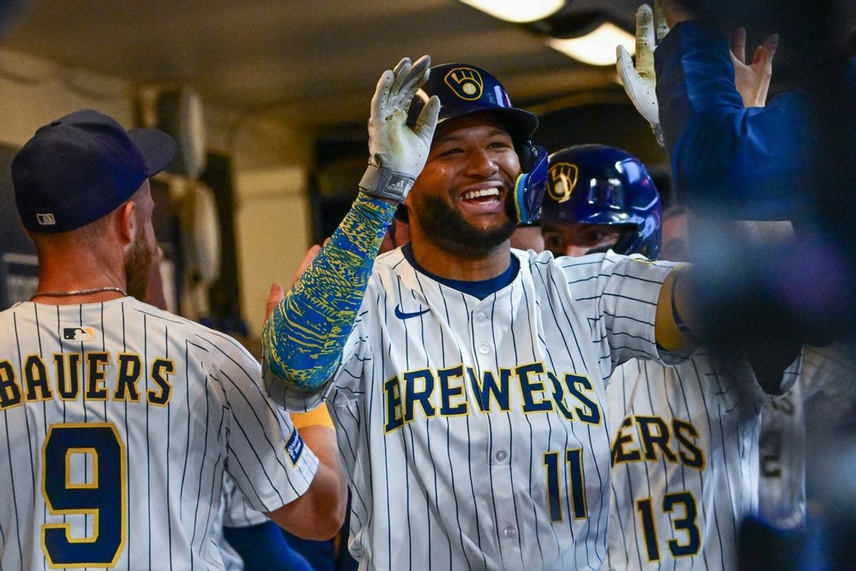 Apr 6, 2025; Milwaukee, Wisconsin, USA; Milwaukee Brewers left fielder Jackson Chourio (11) celebrates after hitting a 3-run home run in the fourth inning against the Cincinnati Reds at American Family Field. Mandatory Credit: Benny Sieu-Imagn Images