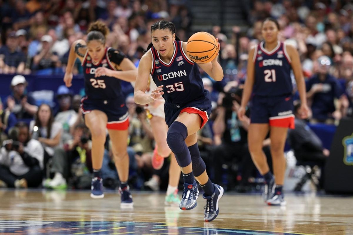 Apr 6, 2025; Tampa, FL, USA; Connecticut Huskies guard Azzi Fudd (35) dribbles the ball against the South Carolina Gamecocks during the first half of the national championship of the women's 2025 NCAA tournament at Amalie Arena. Mandatory Credit: Nathan Ray Seebeck-Imagn Images