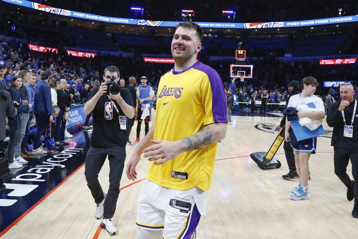 Apr 6, 2025; Oklahoma City, Oklahoma, USA; Los Angeles Lakers guard Luka Doncic (77) runs off the court after his team beat the Oklahoma City Thunder during the second half at Paycom Center. Mandatory Credit: Alonzo Adams-Imagn Images
