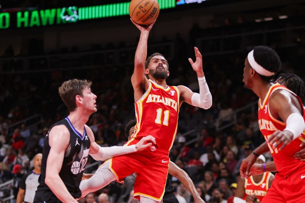 Apr 6, 2025; Atlanta, Georgia, USA; Atlanta Hawks guard Trae Young (11) shoots against the Utah Jazz in the second quarter at State Farm Arena. Mandatory Credit: Brett Davis-Imagn Images