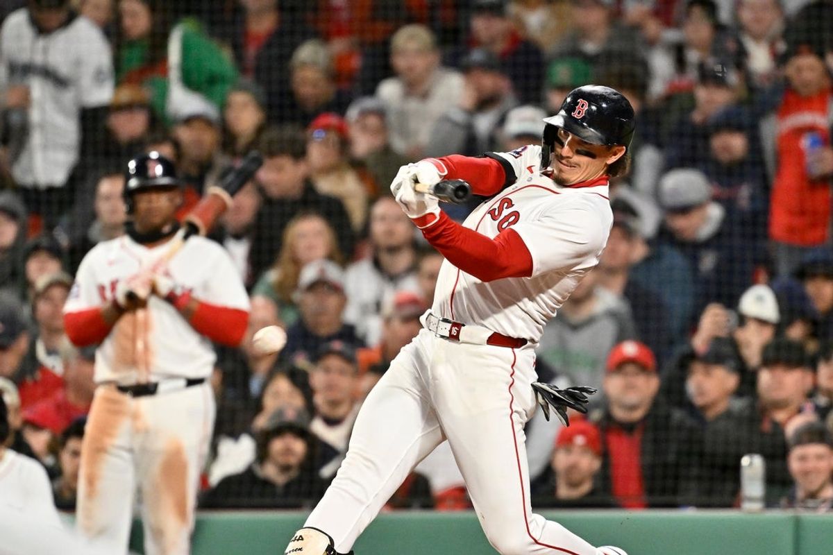 Apr 6, 2025; Boston, Massachusetts, USA; Boston Red Sox left fielder Jarren Duran (16) hits an RBI single against the St. Louis Cardinals during the third inning at Fenway Park. Mandatory Credit: Eric Canha-Imagn Images