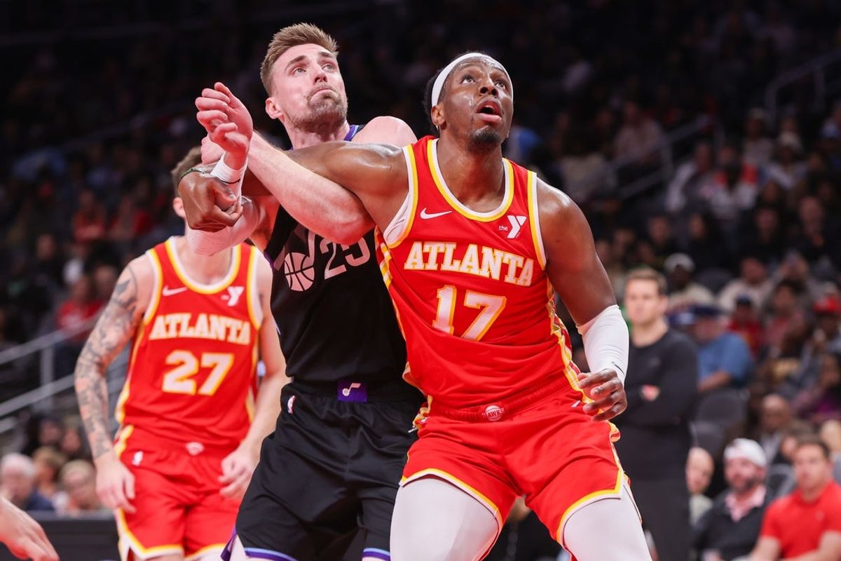 Apr 6, 2025; Atlanta, Georgia, USA; Atlanta Hawks forward Onyeka Okongwu (17) boxes out Utah Jazz center Micah Potter (25) in the third quarter at State Farm Arena. Mandatory Credit: Brett Davis-Imagn Images