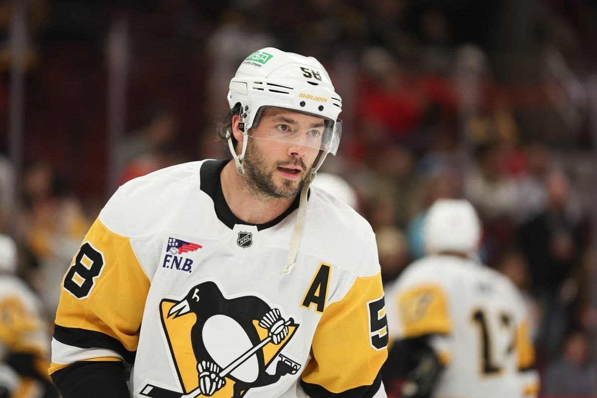 Apr 6, 2025; Chicago, Illinois, USA; Pittsburgh Penguins defenseman Kris Letang (58) warms up before a game against the Chicago Blackhawks at United Center. Mandatory Credit: Talia Sprague-Imagn Images