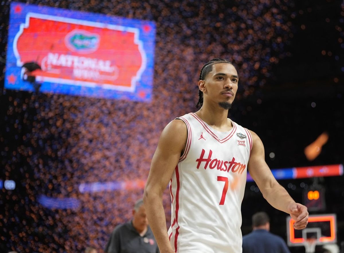 Apr 7, 2025; San Antonio, TX, USA;  Houston Cougars guard Milos Uzan (7) walks off the court after losing to the Florida Gators in the national championship game of the Final Four of the 2025 NCAA Tournament at the Alamodome. Mandatory Credit: Robert Deutsch-Imagn Images