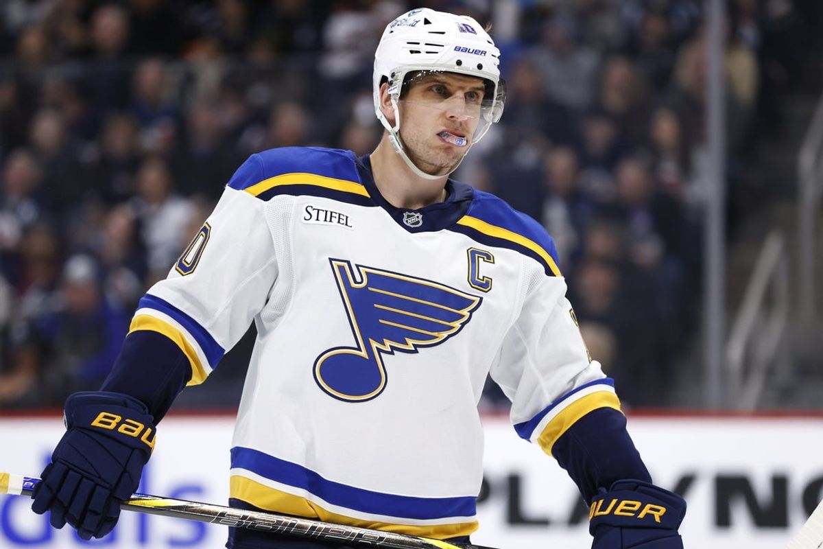 Apr 7, 2025; Winnipeg, Manitoba, CAN; St. Louis Blues center Brayden Schenn (10) looks on during a break in play against the Winnipeg Jets in the first period at Canada Life Centre. Mandatory Credit: James Carey Lauder-Imagn Images