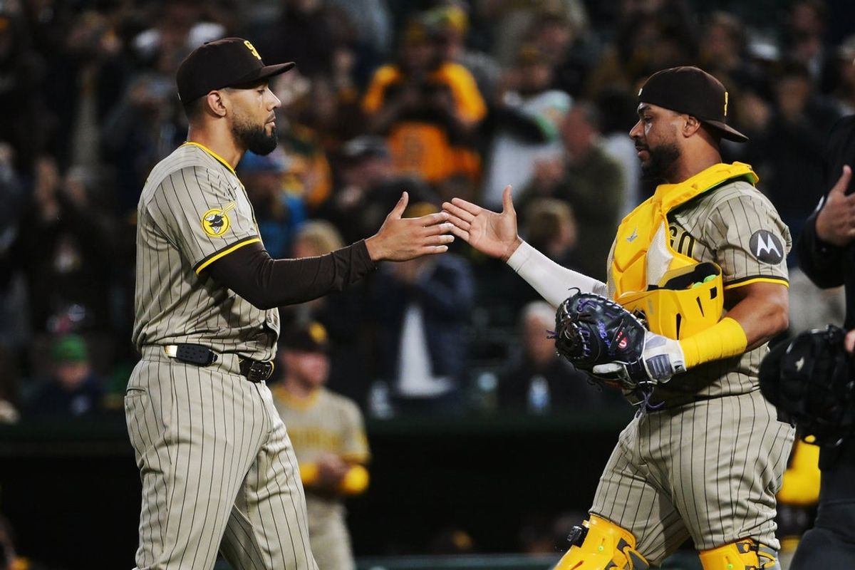 Apr 7, 2025; West Sacramento, California, USA; San Diego Padres pitcher Robert Suarez (75) celebrates with catcher Elias Díaz (17) after defeating the Athletics at Sutter Health Park. Mandatory Credit: Ed Szczepanski-Imagn Images