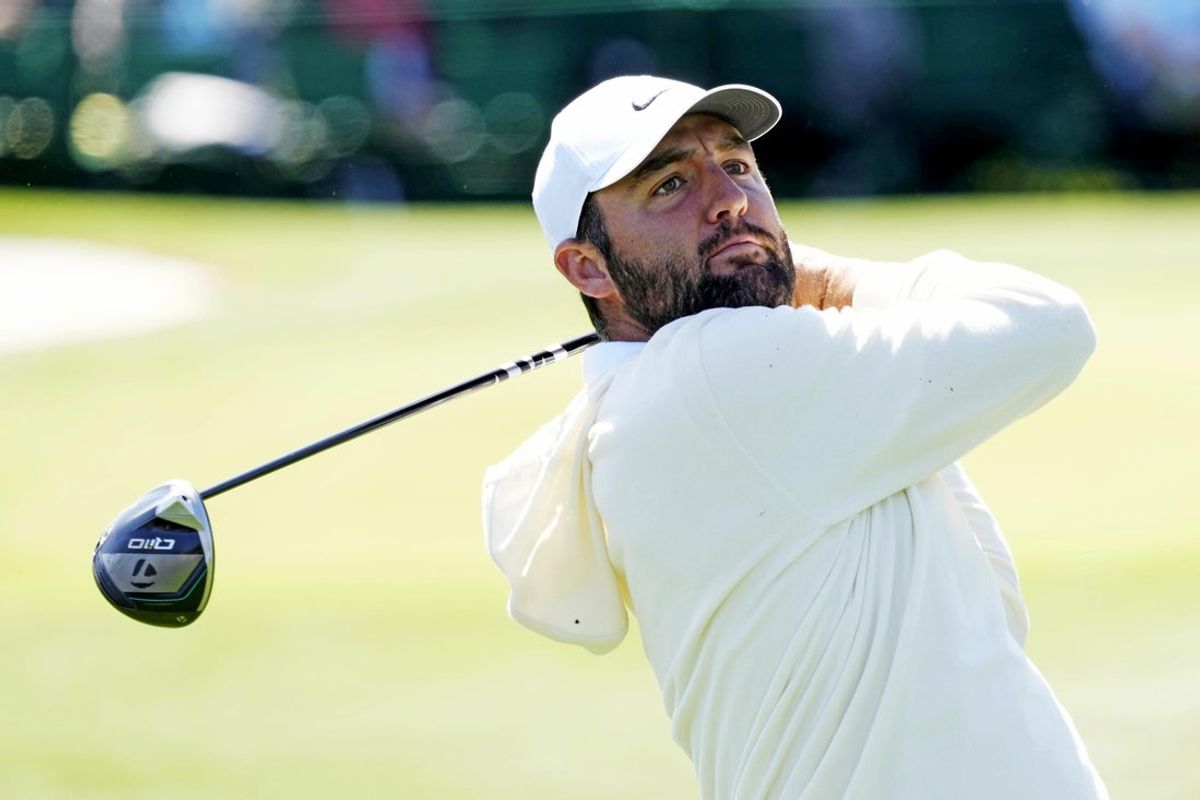 Apr 8, 2025; Augusta, Georgia, USA; Scottie Scheffler hits from the third tee during a practice round for the Masters Tournament at Augusta National Golf Club. Mandatory Credit: Michael Madrid-Imagn Images