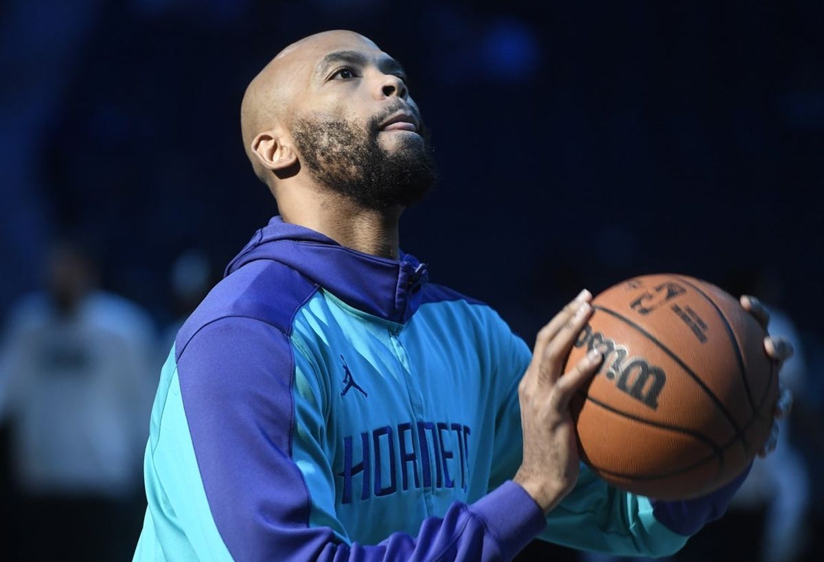 Apr 8, 2025; Charlotte, North Carolina, USA;  Charlotte Hornets center center Taj Gibson (67) warms up before the game against the Memphis Grizzlies at the Spectrum Center. Mandatory Credit: Sam Sharpe-Imagn Images