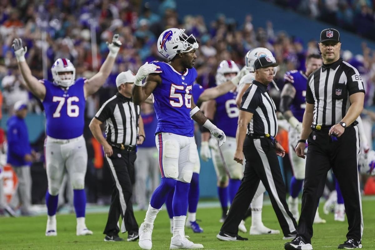 Jan 7, 2024; Miami Gardens, Florida, USA; Buffalo Bills defensive end Leonard Floyd (56) celebrates after winning the game against the Miami Dolphins at Hard Rock Stadium.