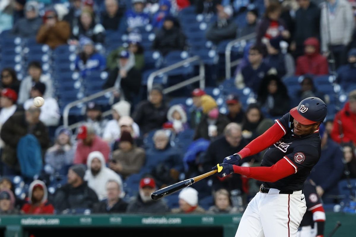 Apr 8, 2025; Washington, District of Columbia, USA; Washington Nationals outfielder James Wood (29) hits a two run home run against the Los Angeles Dodgers during the first inning at Nationals Park. Mandatory Credit: Geoff Burke-Imagn Images