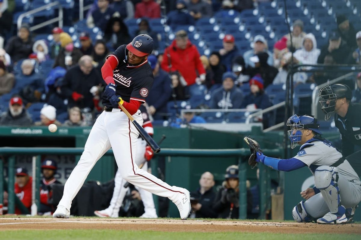 Apr 8, 2025; Washington, District of Columbia, USA; Washington Nationals outfielder James Wood (29) hits a two run home run against the Los Angeles Dodgers during the first inning at Nationals Park. Mandatory Credit: Geoff Burke-Imagn Images