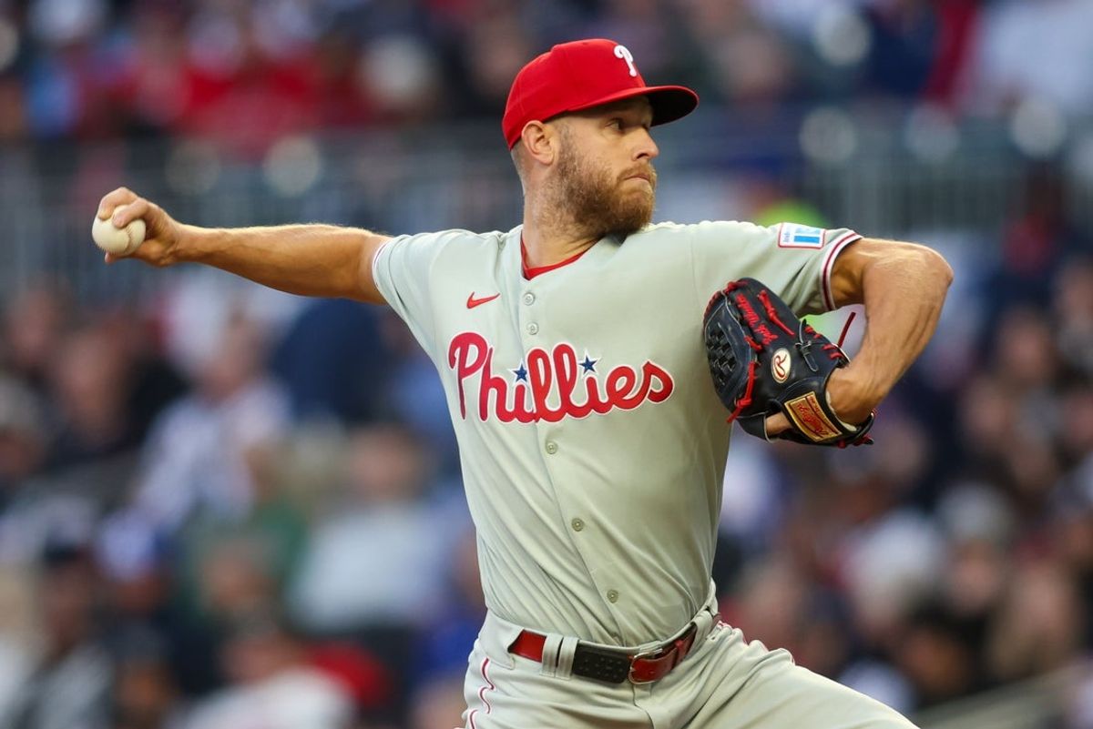 Apr 8, 2025; Atlanta, Georgia, USA; Philadelphia Phillies starting pitcher Zack Wheeler (45) throws against the Atlanta Braves in the second inning at Truist Park. Mandatory Credit: Brett Davis-Imagn Images