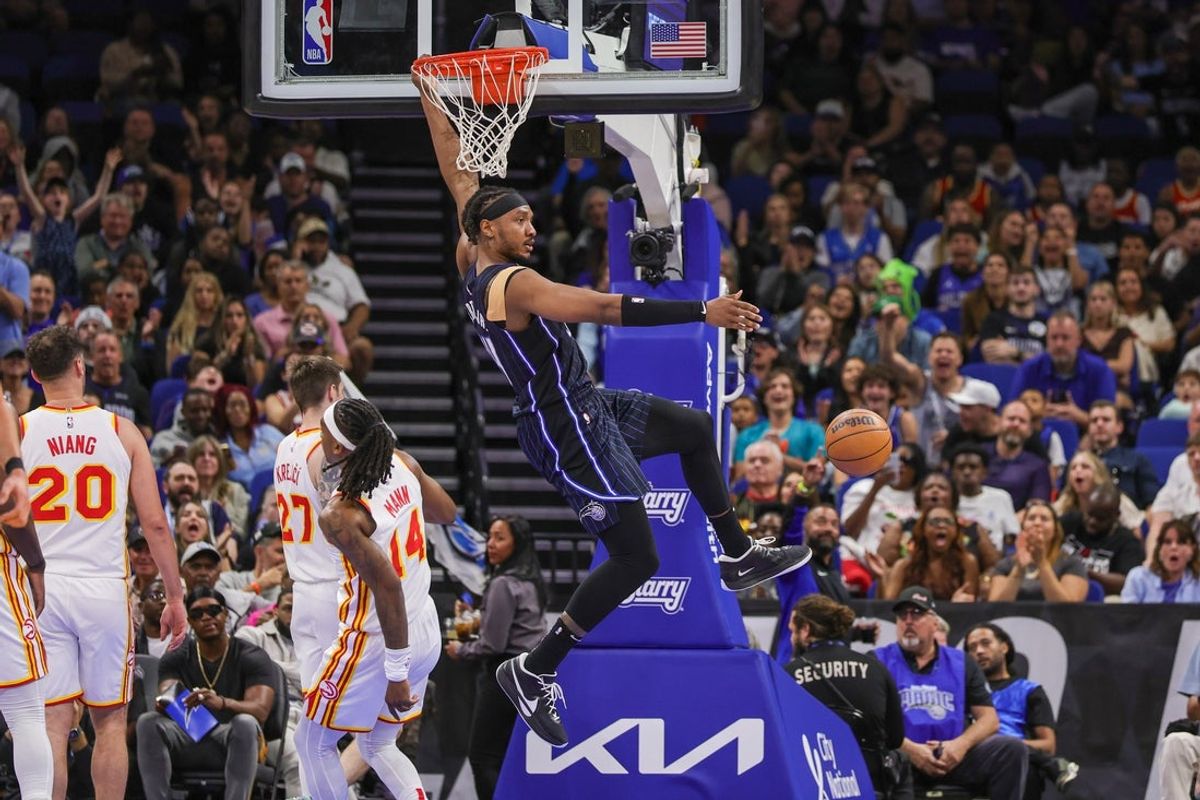 Apr 8, 2025; Orlando, Florida, USA; Orlando Magic center Wendell Carter Jr. (34) dunks during the second quarter against the Atlanta Hawks at Kia Center. Mandatory Credit: Mike Watters-Imagn Images