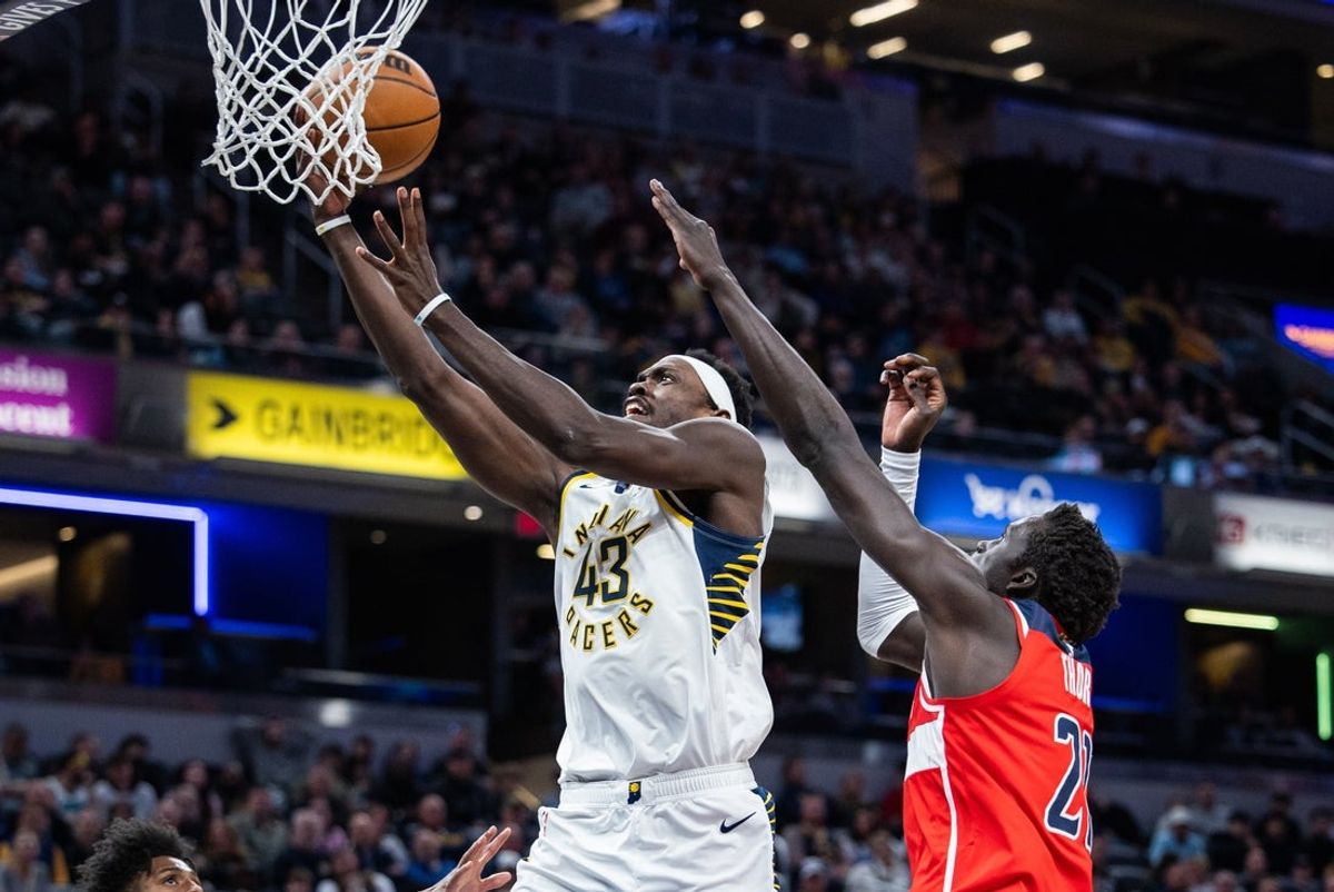Apr 8, 2025; Indianapolis, Indiana, USA; Indiana Pacers forward Pascal Siakam (43) shoots the ball while Washington Wizards forward JT Thor (21) defends in the first half at Gainbridge Fieldhouse. Mandatory Credit: Trevor Ruszkowski-Imagn Images