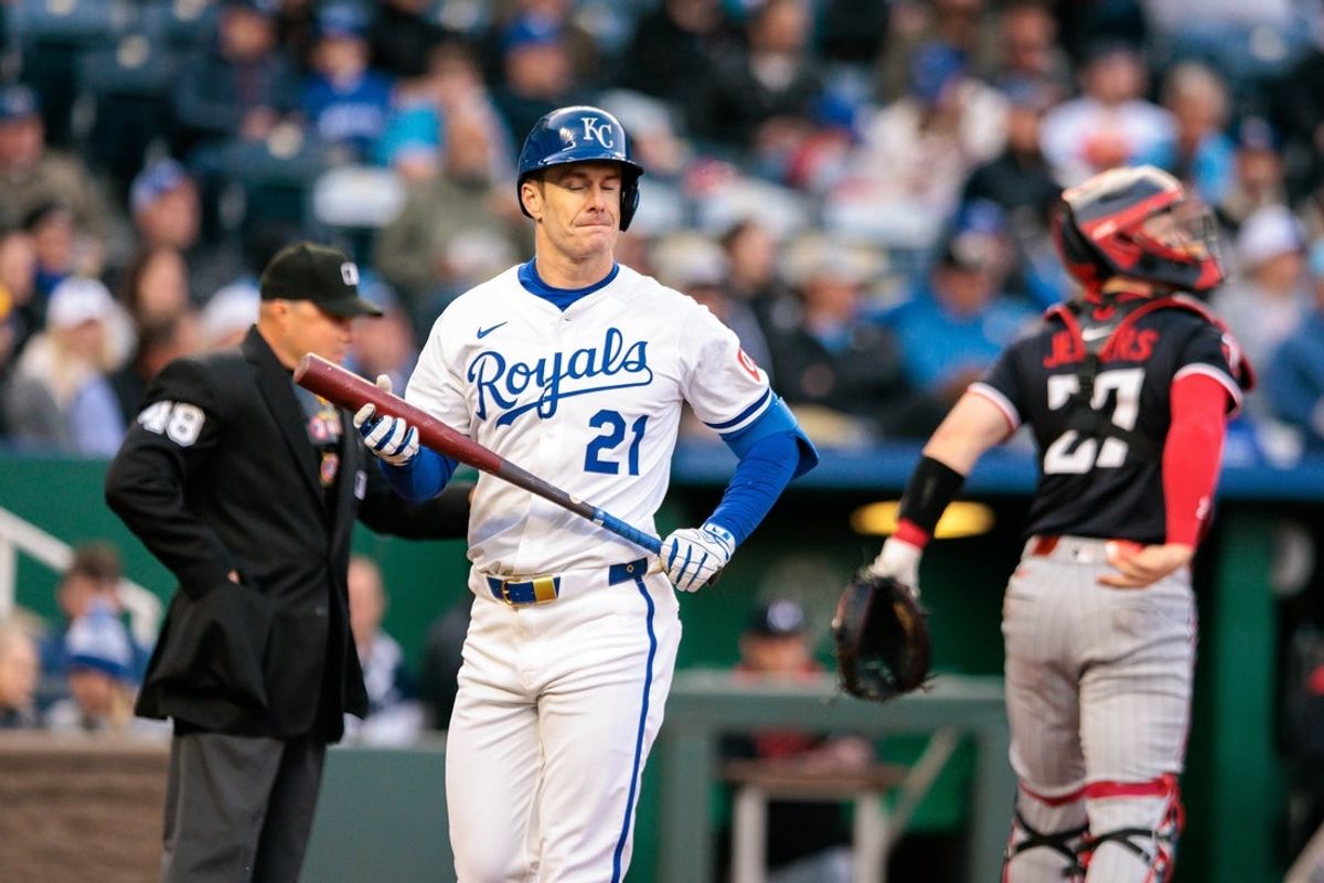 Apr 8, 2025; Kansas City, Missouri, USA; Kansas City Royals first base Mark Canha (21) reacts after a strike out during the second inning against the Minnesota Twins  at Kauffman Stadium. Mandatory Credit: William Purnell-Imagn Images