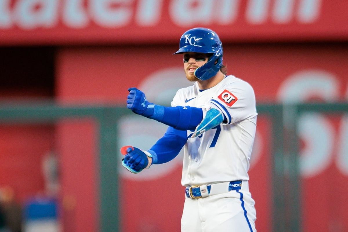 Apr 8, 2025; Kansas City, Missouri, USA;  Kansas City Royals shortstop Bobby Witt Jr. (7) reacts after hitting a double during the fourth inning against the Minnesota Twins at Kauffman Stadium. Mandatory Credit: William Purnell-Imagn Images