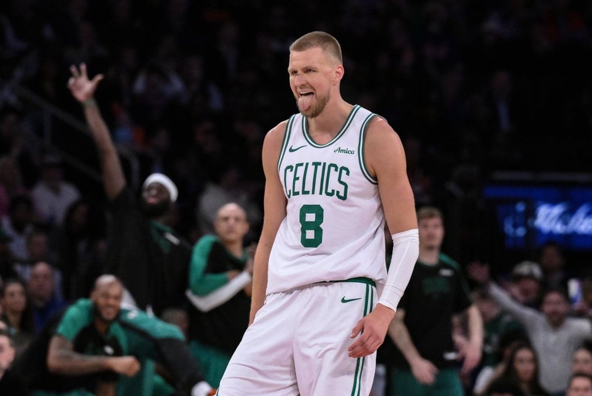 Apr 8, 2025; New York, New York, USA; Boston Celtics center Kristaps Porzingis (8) reacts during the second half against the New York Knicks at Madison Square Garden. Mandatory Credit: John Jones-Imagn Images