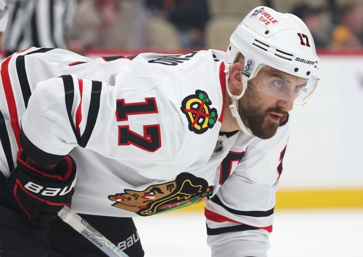 Apr 8, 2025; Pittsburgh, Pennsylvania, USA;  Chicago Blackhawks left wing Nick Foligno (17) at the face-off circle against the Pittsburgh Penguins during the third period at PPG Paints Arena. Mandatory Credit: Charles LeClaire-Imagn Images