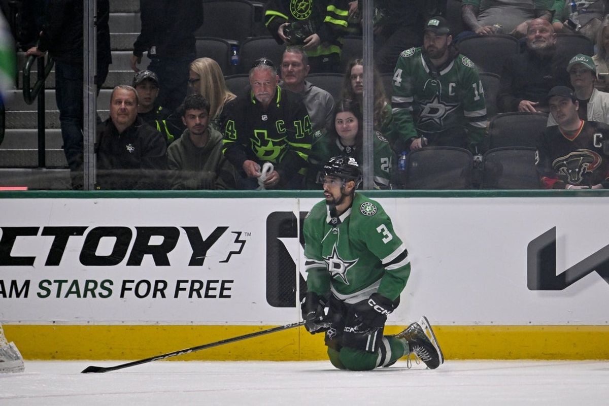 Apr 8, 2025; Dallas, Texas, USA; Dallas Stars defenseman Matt Dumba (3) looks on as the Vancouver Canucks celebrate the victory over the Stars in the overtime period at the American Airlines Center. Mandatory Credit: Jerome Miron-Imagn Images