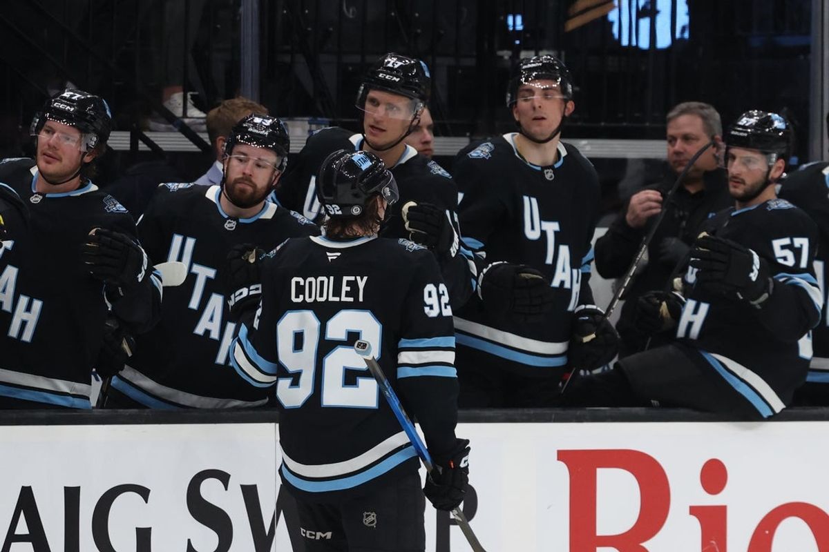 Apr 8, 2025; Salt Lake City, Utah, USA; Utah Hockey Club center Logan Cooley (92) celebrates a power play goal against the Seattle Kraken during the second period at Delta Center. Mandatory Credit: Rob Gray-Imagn Images