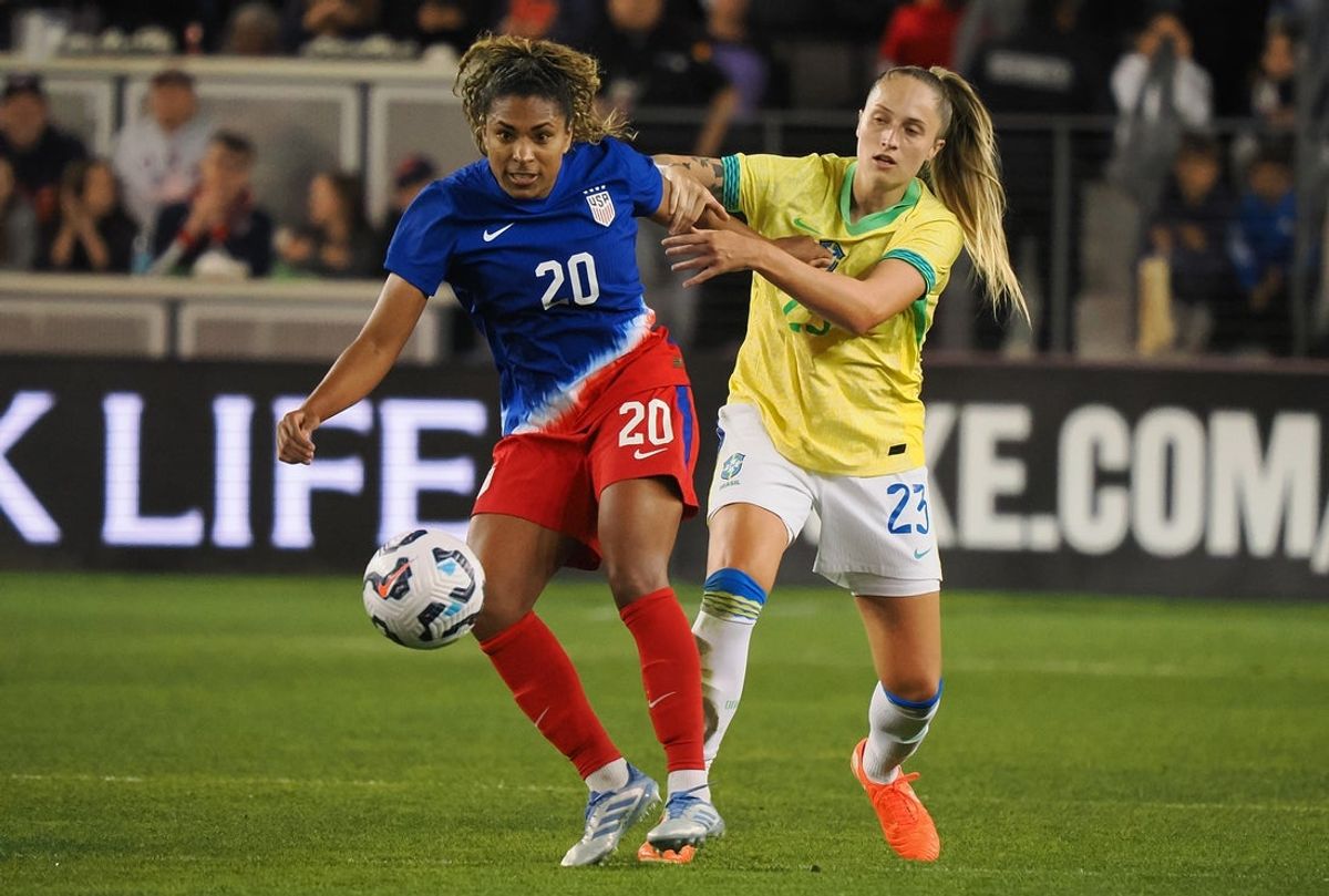 Apr 8, 2025; San Jose, California, USA; USWNT forward Catarina Macario (20) controls the ball ahead of Brazil defender Isa Haas (23) during the first half at PayPal Park. Mandatory Credit: Kelley L Cox-Imagn Images